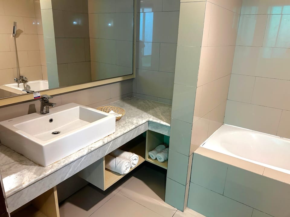 Studio Suite | Bathroom | Slippers, bidet, towels
