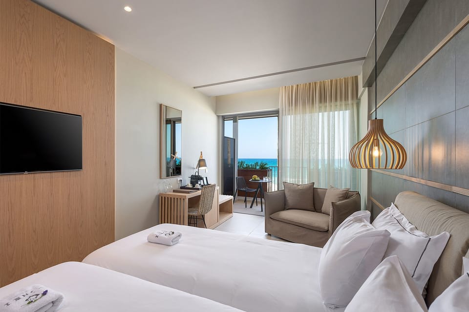 Superior Suite, Sea View | In-room safe, blackout drapes, soundproofing, iron/ironing board