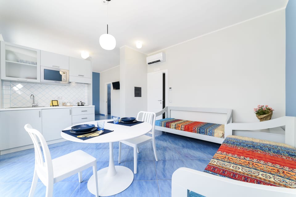 City Apartment | Living area | 40-inch Smart TV with digital channels, TV