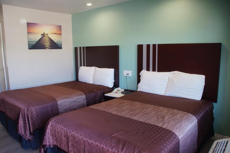 Pillowtop beds, desk, laptop workspace, iron/ironing board