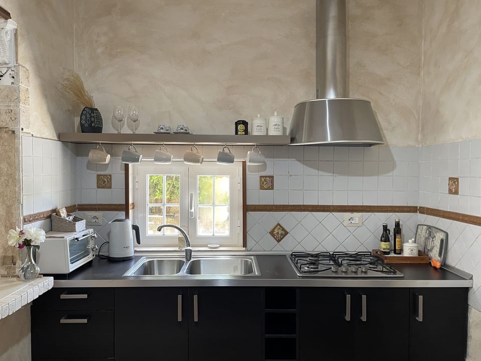 Deluxe Apartment | Private kitchen | Electric kettle
