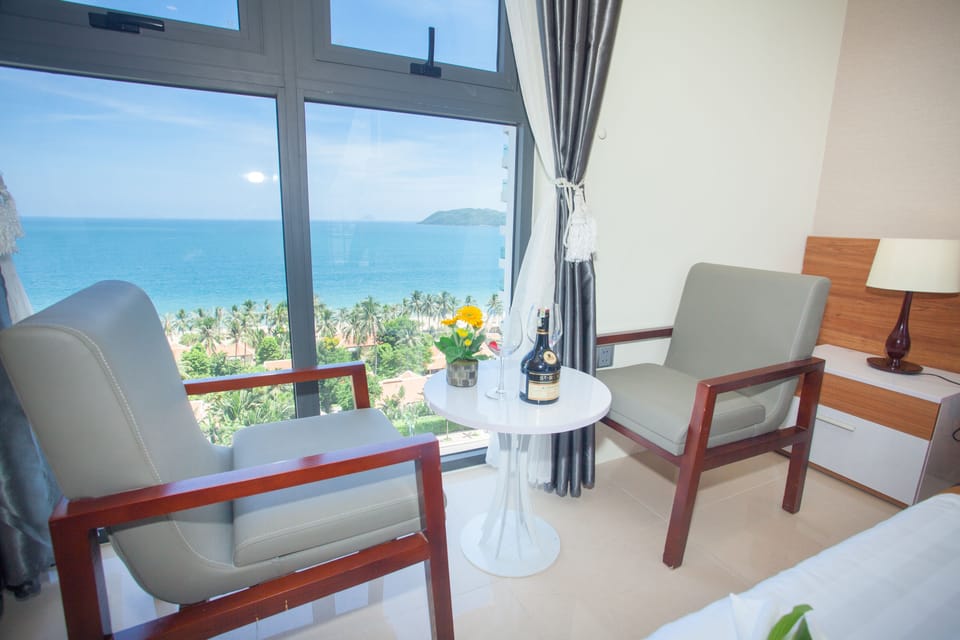 Deluxe Double Room, Ocean View | Minibar, in-room safe, desk, soundproofing