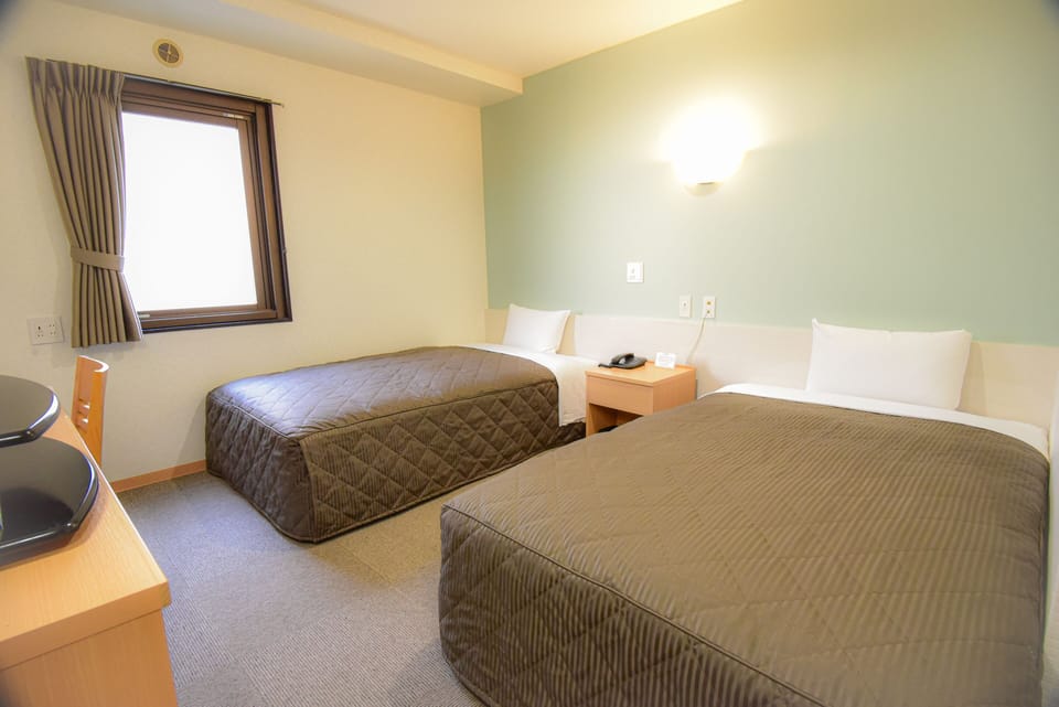 Twin Room, 2 Twin Beds, Non Smoking | Desk, laptop workspace, blackout drapes, iron/ironing board