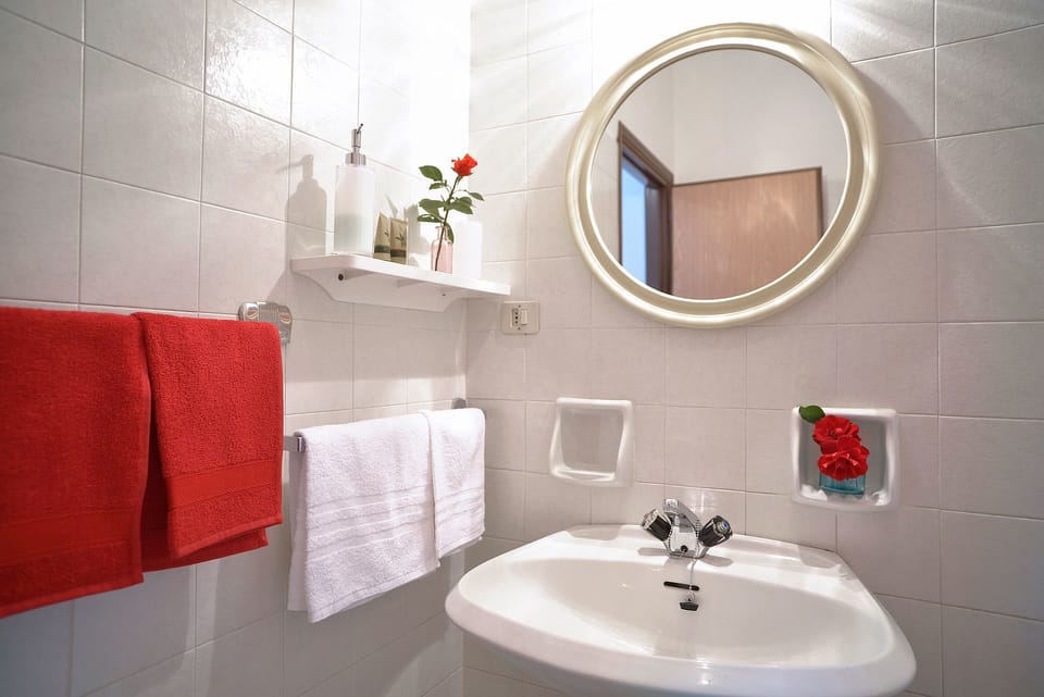 Superior Triple Room | Bathroom | Shower, hair dryer, bathrobes, towels