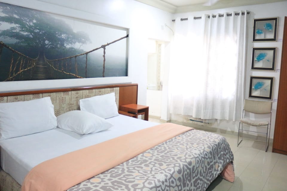 Deluxe Room, 1 Double Bed, Non Smoking | Desk, blackout drapes, bed sheets