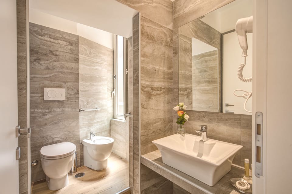 Superior Double Room | Bathroom | Shower, rainfall showerhead, slippers, bidet
