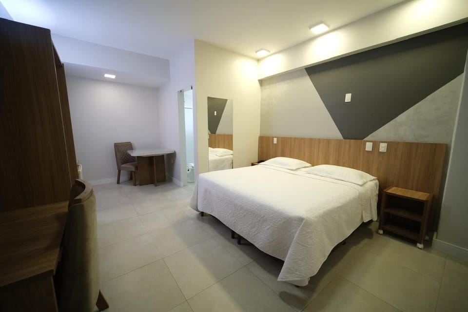  Apartamento Executivo 2 | Minibar, blackout drapes, iron/ironing board, free WiFi