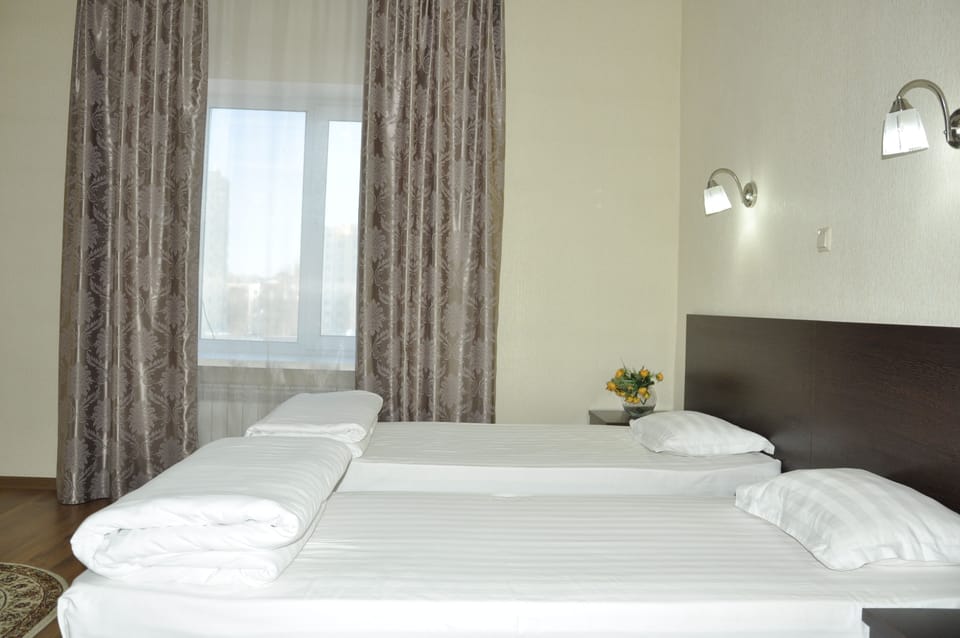 Comfort Quadruple Room | Egyptian cotton sheets, premium bedding, in-room safe, desk