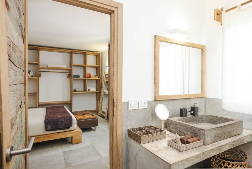 Moja Private Beachfront Suite, Amani Home Zanzibar | Bathroom | Shower, rainfall showerhead, free toiletries, hair dryer