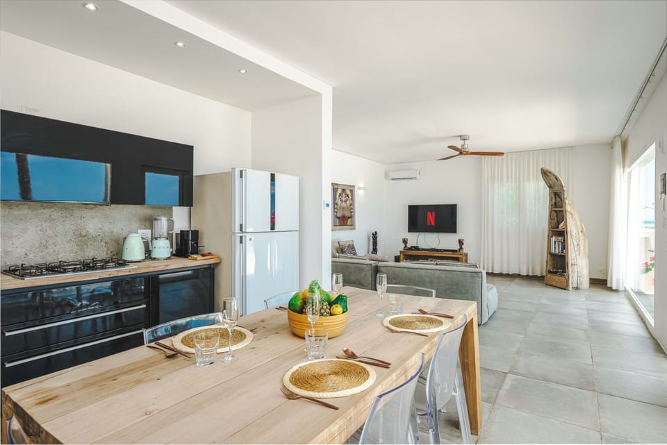 Moja Private Beachfront Suite, Amani Home Zanzibar | Private kitchen | Full-size fridge, microwave, oven, stovetop