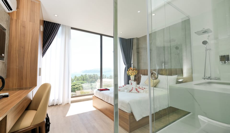 Deluxe Double Room, Partial Ocean View | Desk, free WiFi, bed sheets