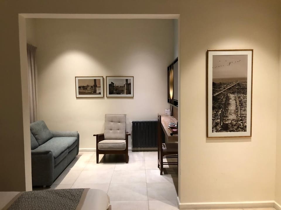 Suite, City View | Minibar, in-room safe, desk, rollaway beds
