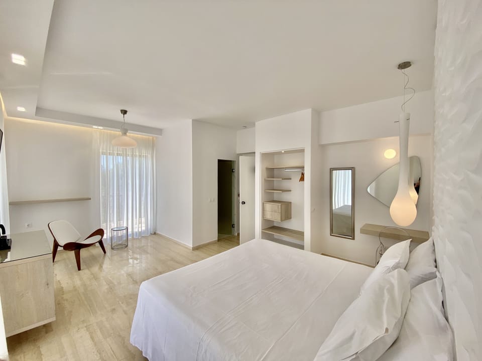 Premium bedding, down comforters, memory foam beds, minibar