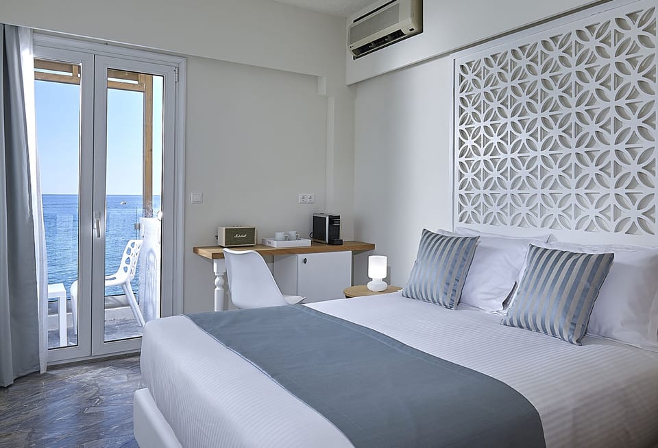 Superior Double Room, Sea View | Egyptian cotton sheets, minibar, in-room safe, desk