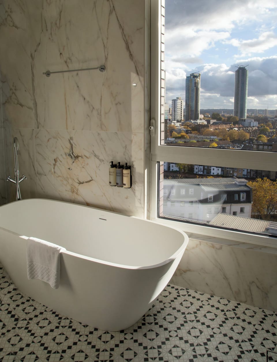 Eco-friendly toiletries, hair dryer, towels