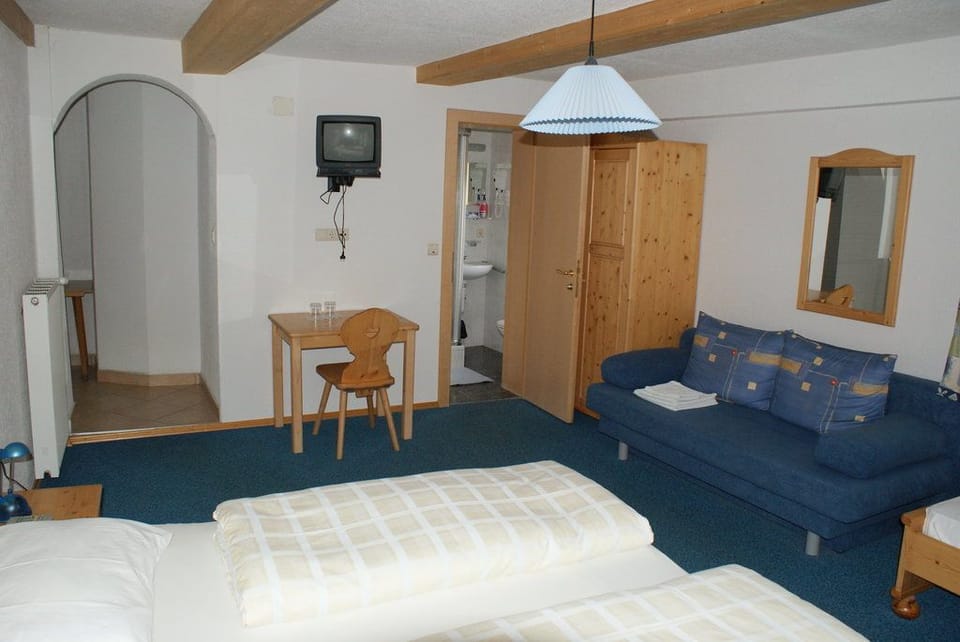 Desk, free WiFi, bed sheets