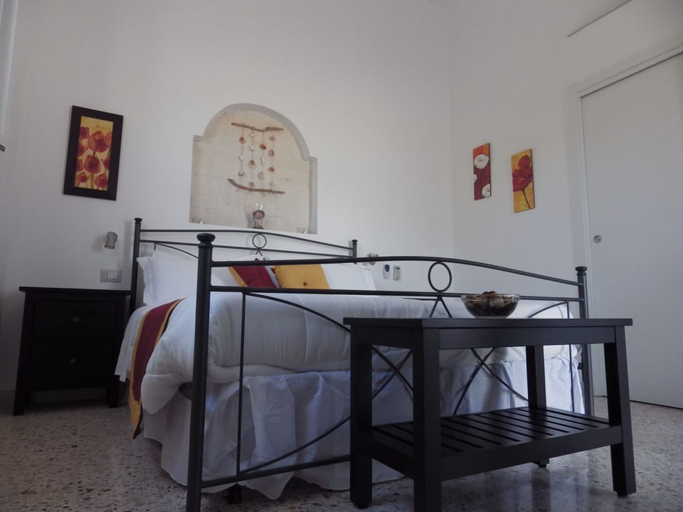Double Room | Minibar, in-room safe, desk, individually decorated