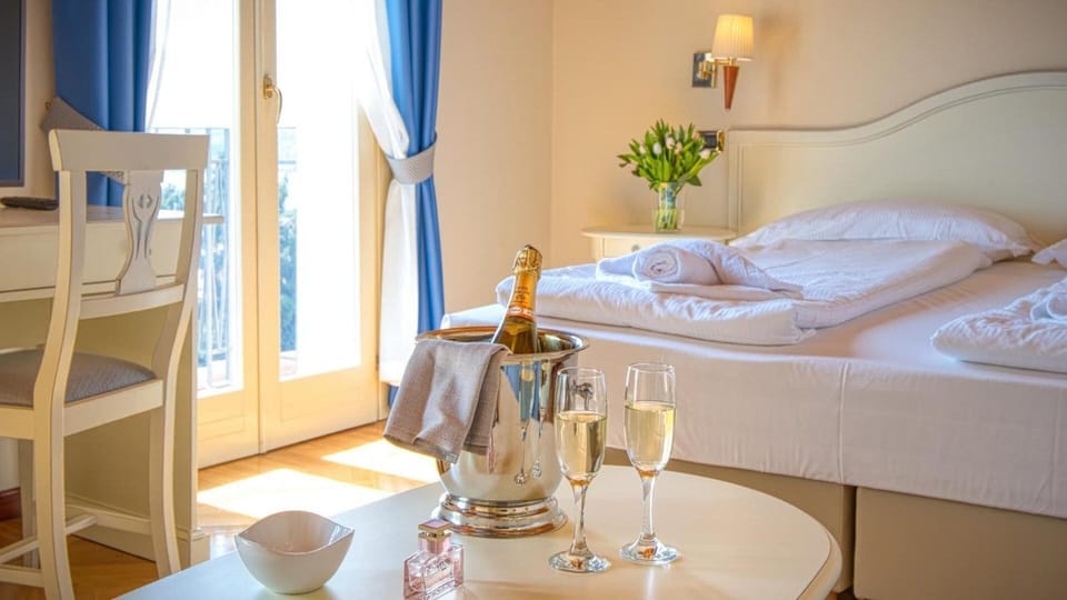 Down comforters, minibar, in-room safe, desk