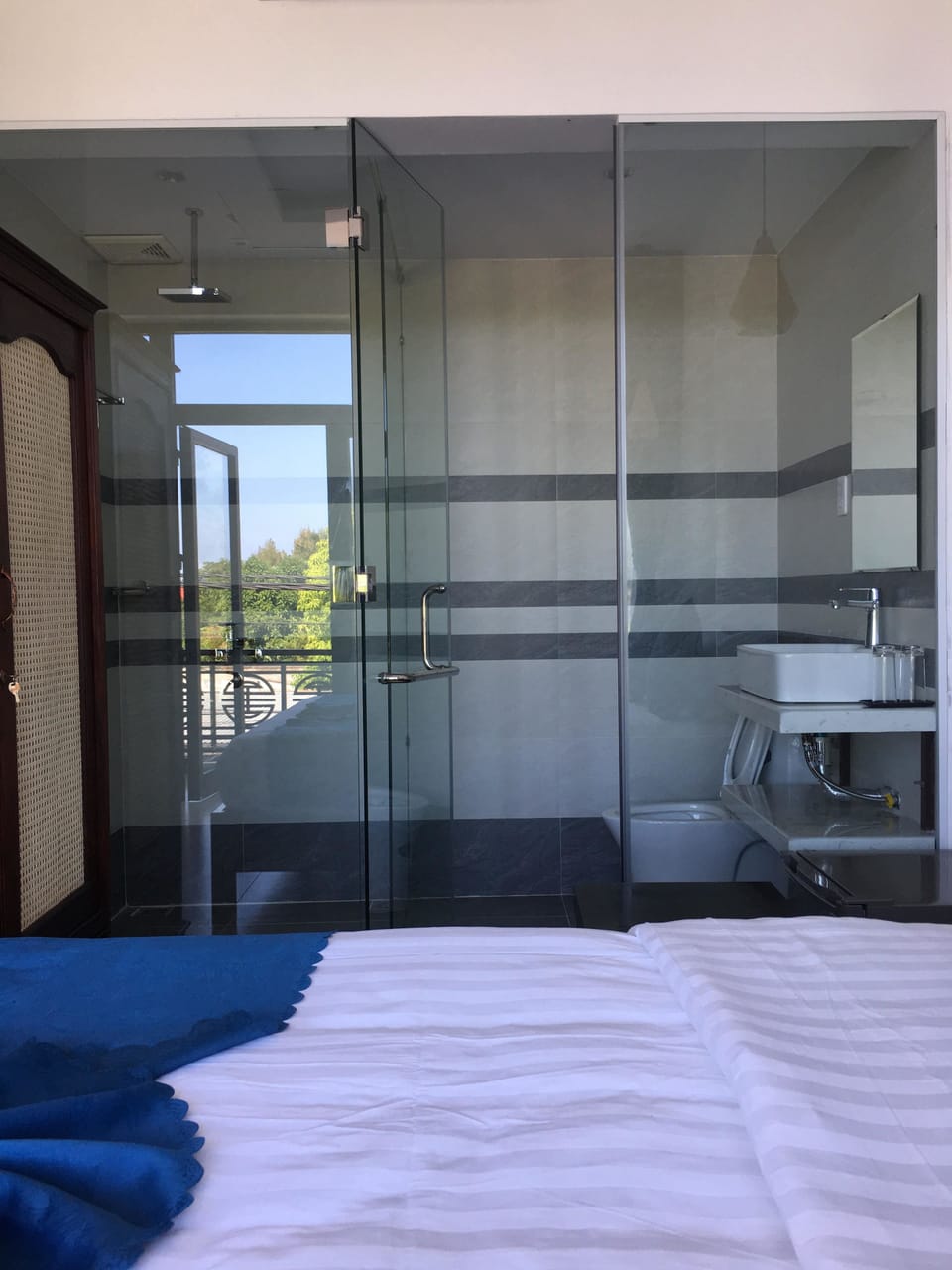 Shower, free toiletries, hair dryer, slippers