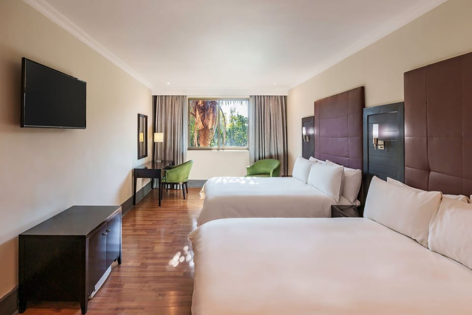 Room, 2 Queen Beds | In-room safe, desk, blackout drapes, iron/ironing board