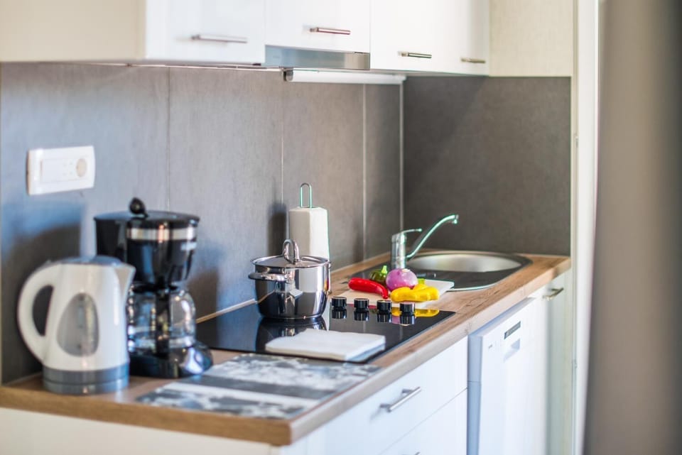 Full-size fridge, microwave, stovetop, espresso maker