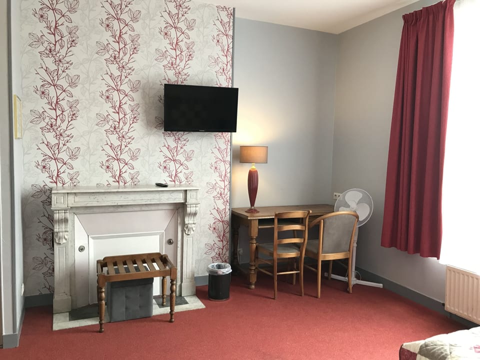 Desk, blackout drapes, iron/ironing board (on request), cribs (free)