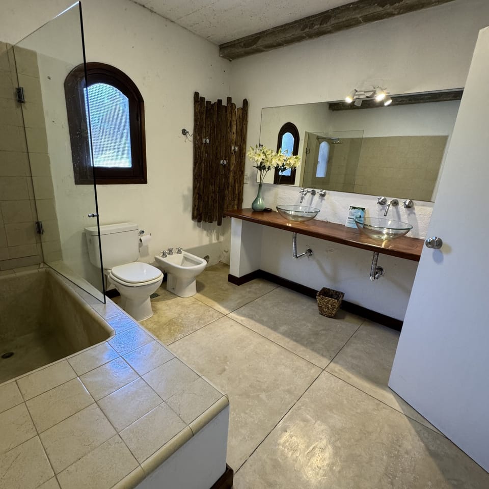 Comfort Suite, 2 Bedrooms, Garden View | Bathroom | Shower, rainfall showerhead, free toiletries, hair dryer