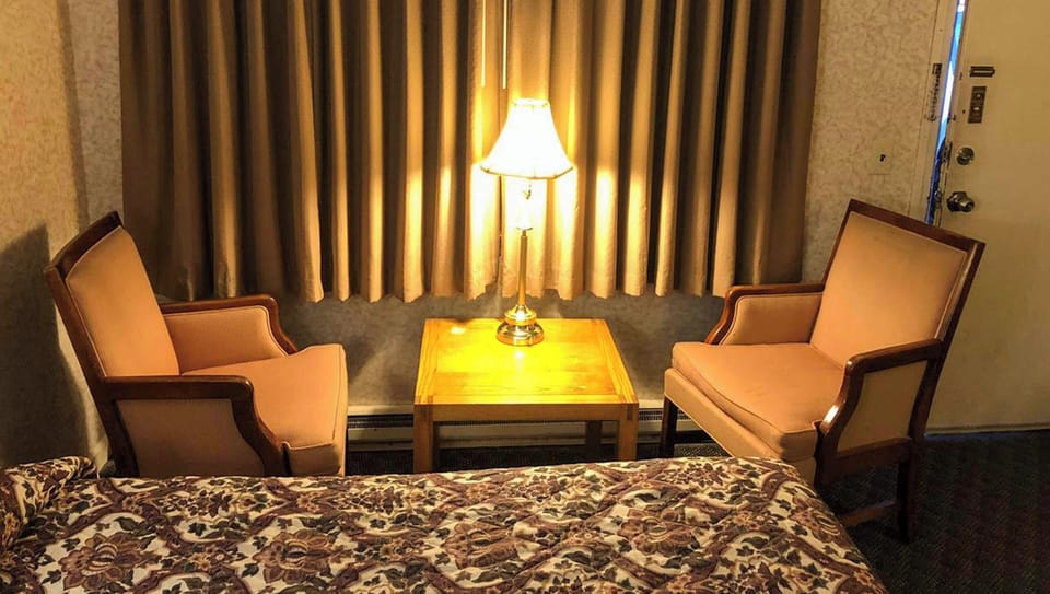 One queen bed non smoking | Desk, laptop workspace, blackout drapes, iron/ironing board