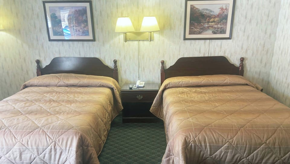 Standard Room, 2 Double Beds | Desk, laptop workspace, blackout drapes, iron/ironing board