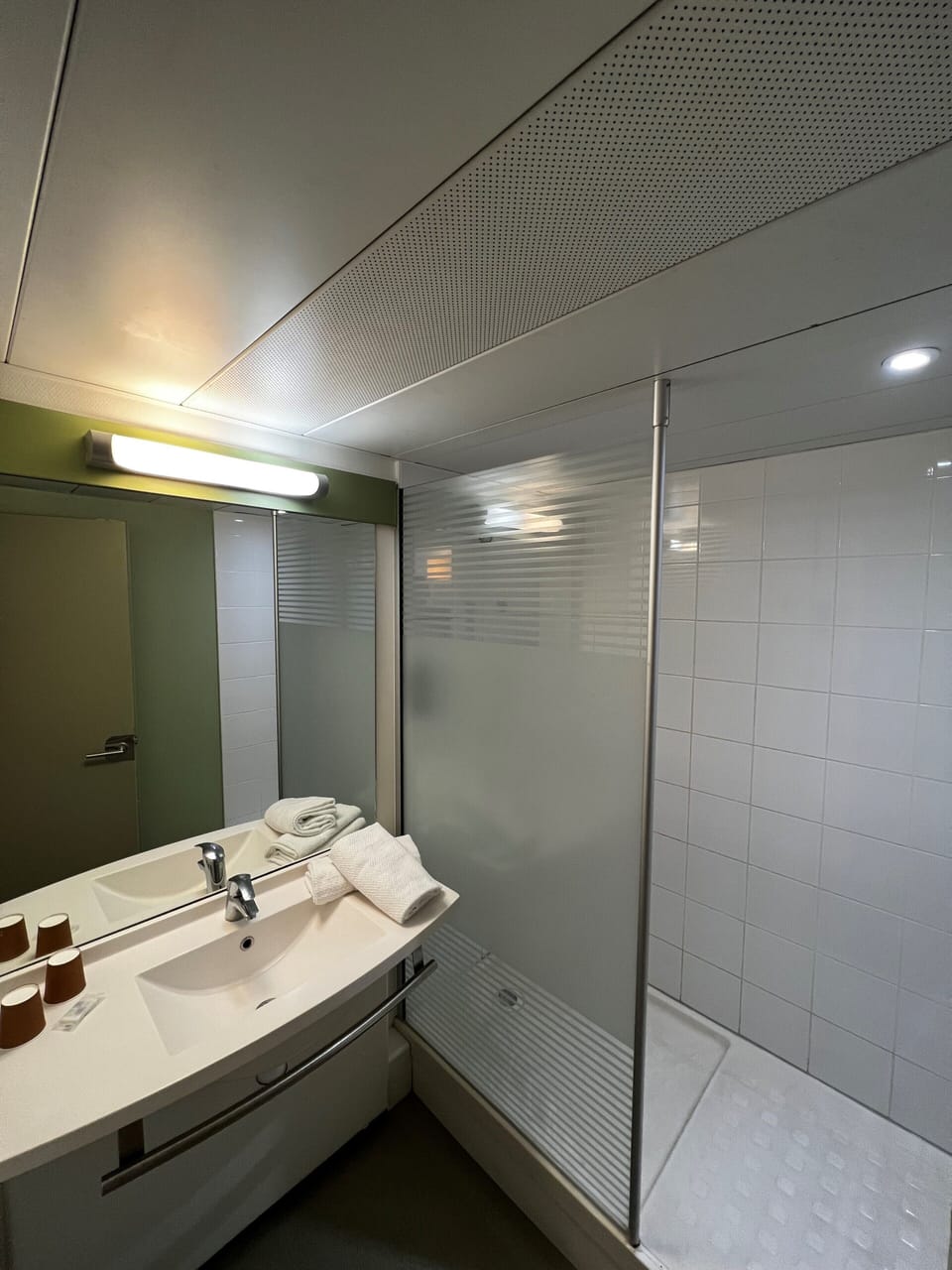 Shower, eco-friendly toiletries, hair dryer, towels