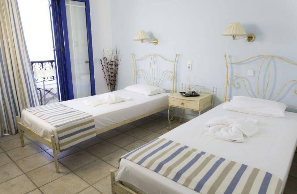 Double or Twin Room, Sea View | Soundproofing, iron/ironing board, free WiFi, bed sheets