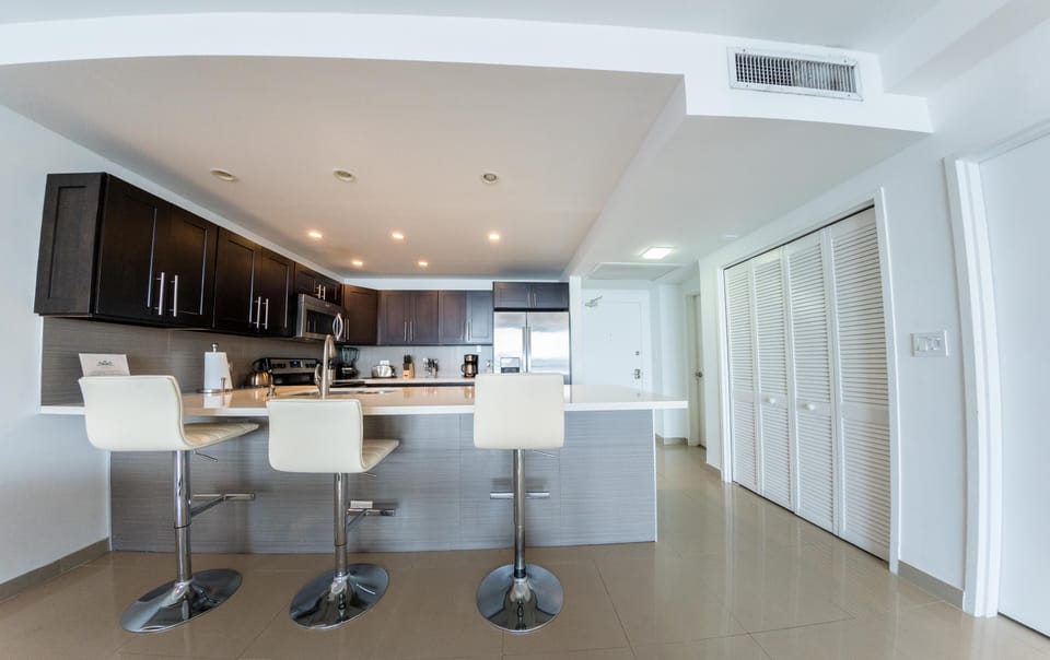 Condo, 2 Bedrooms, Non Smoking (D) | Private kitchen | Full-size fridge, microwave, oven, stovetop