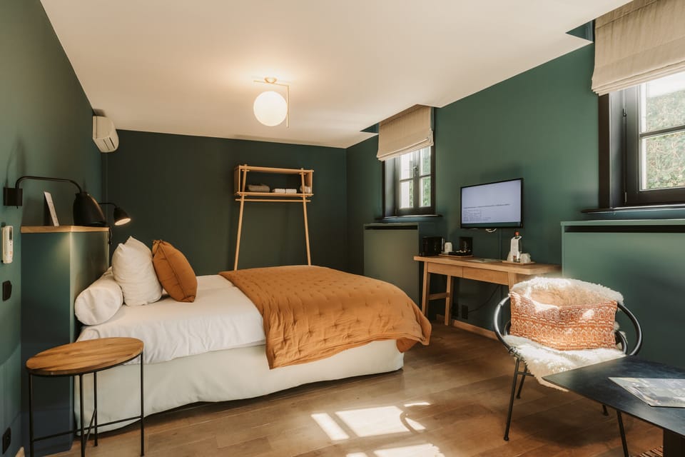 Deluxe Double Room | Down comforters, in-room safe, desk, laptop workspace