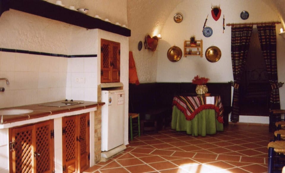 Full-size fridge, microwave, stovetop, cookware/dishes/utensils