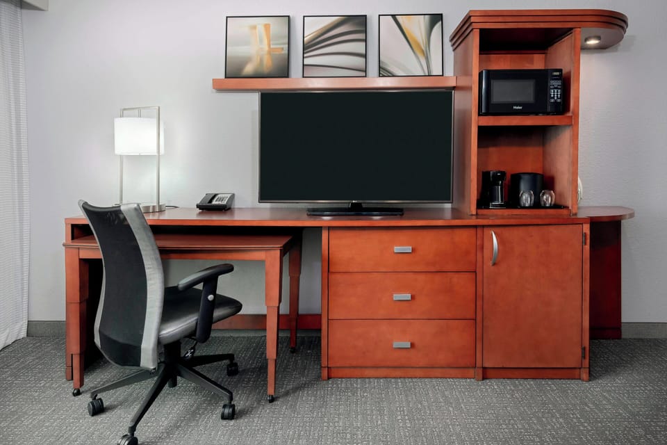 Premium bedding, desk, blackout drapes, iron/ironing board