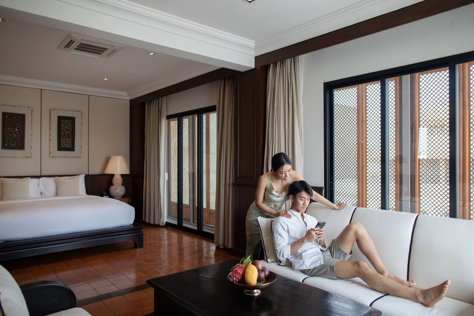 Grand Suite, 1 King Bed, Non Smoking | Living area | 50-inch Smart TV with cable channels, TV