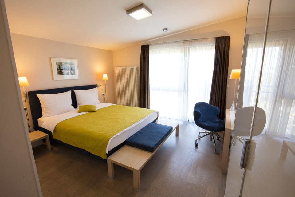 Standard Double Room | Minibar, desk, laptop workspace, iron/ironing board