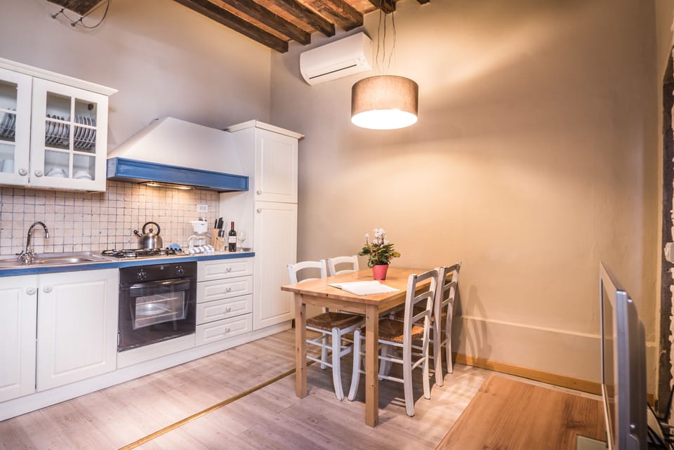 Apartment, 2 Bedrooms | Private kitchen | Full-size fridge, stovetop, cookware/dishes/utensils