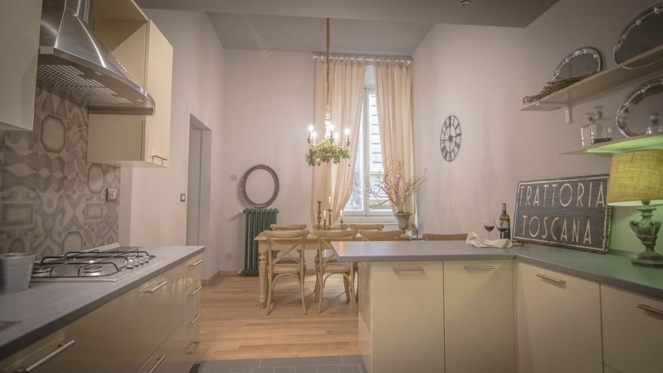 Apartment, 4 Bedrooms | Private kitchen | Full-size fridge, stovetop, highchair, cookware/dishes/utensils