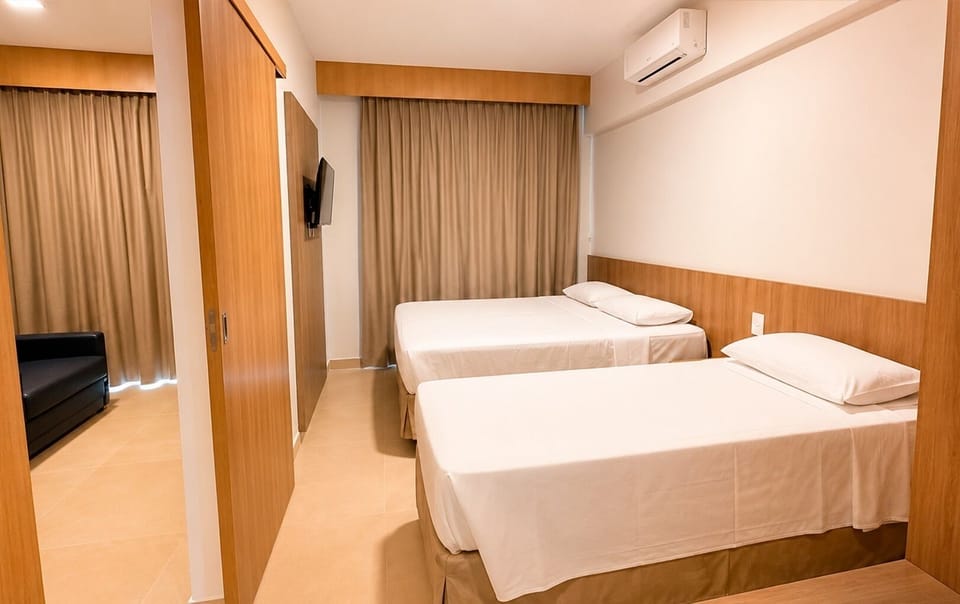 Standard Suite | Minibar, in-room safe, blackout drapes, soundproofing