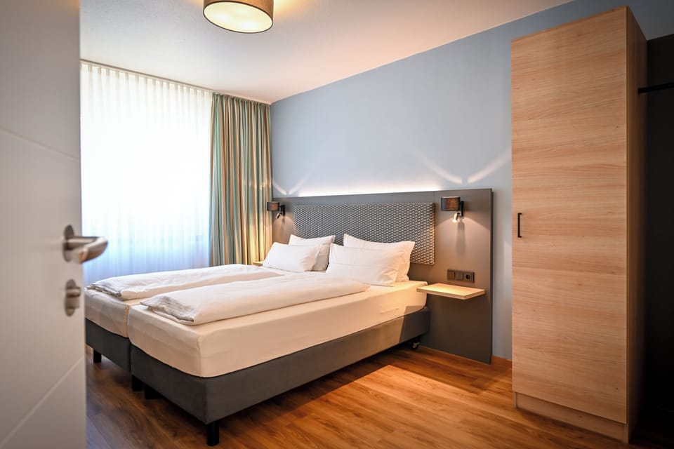 Classic Double Room | Living area | Flat-screen TV