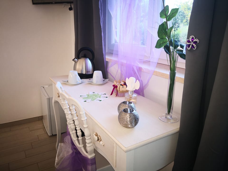 Deluxe Double Room, Garden View | In-room safe, individually decorated, individually furnished, desk