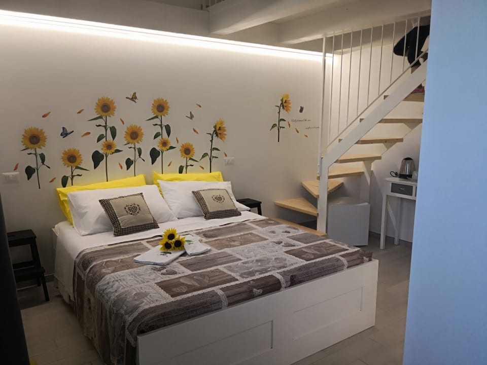 Comfort Room, Garden View | In-room safe, individually decorated, individually furnished, desk