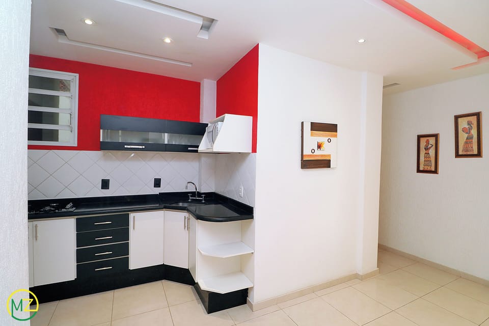 Design Apartment, Multiple Beds, Non Smoking | Private kitchen | Full-size fridge, microwave, oven, coffee/tea maker
