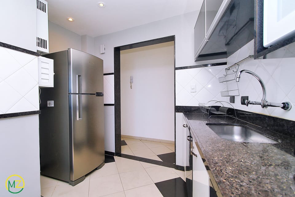 Penthouse, Multiple Beds, Non Smoking | Private kitchen | Full-size fridge, microwave, oven, stovetop
