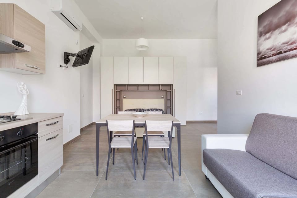 Comfort Apartment, 2 Bedrooms | Living area | Flat-screen TV