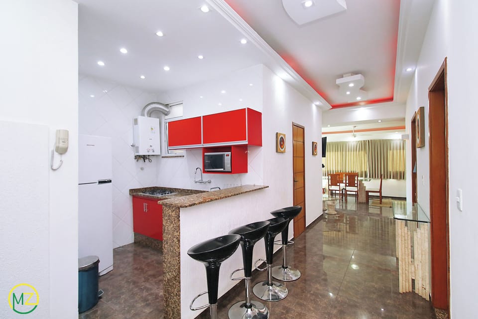 Apartment | Private kitchen | Full-size fridge, microwave, stovetop, cookware/dishes/utensils