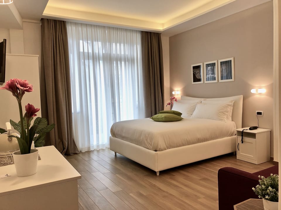 Deluxe Double Room, City View | Premium bedding, down comforters, memory foam beds, minibar