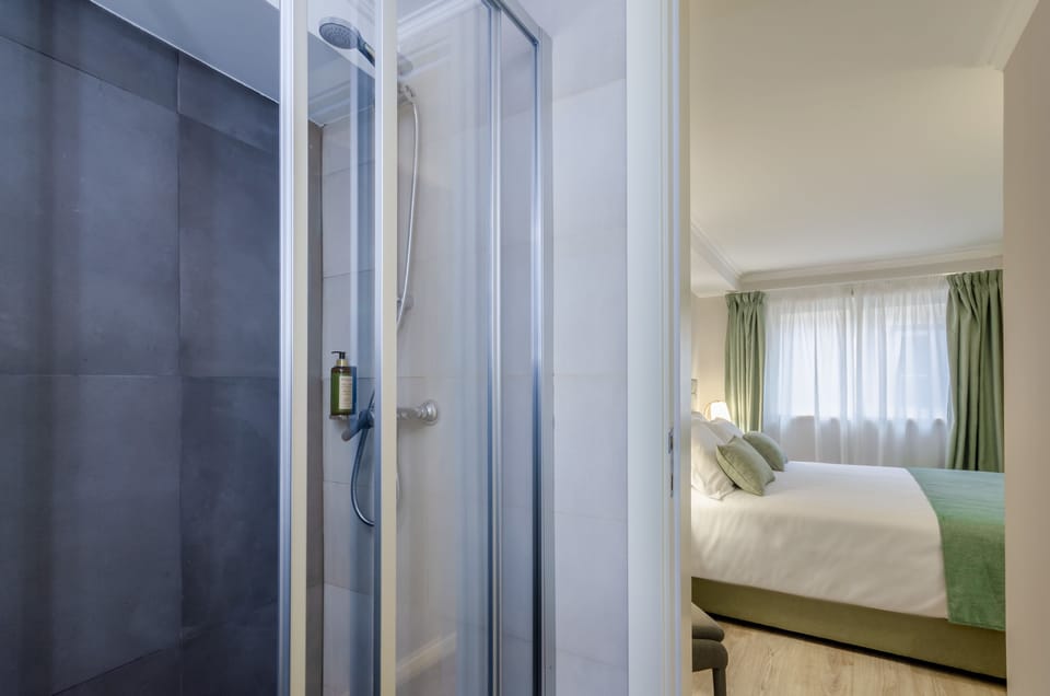 Basic Double Room, 1 Queen Bed | Bathroom | Shower, free toiletries, hair dryer, towels
