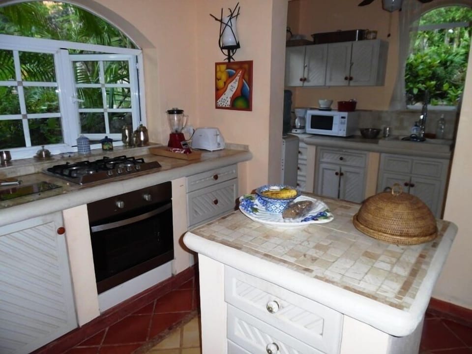 Fridge, microwave, stovetop, cookware/dishes/utensils